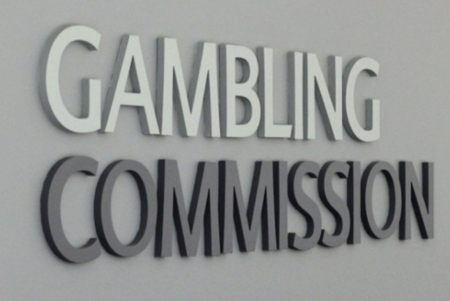The official logo of the UK Gambling Commission in the HQ.